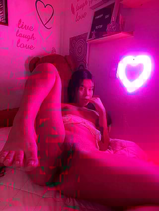 Joy's Seductive Glance: A Photograph That Speaks Volumes'